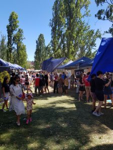 The marquees are falling due to wind, confusion ensues.