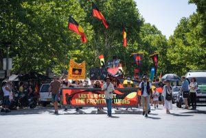 Protesters at the rally holding signs